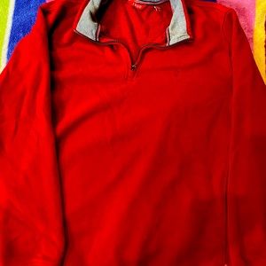 Two “IZOD” quarter zip top.  Used but clean. Size L.